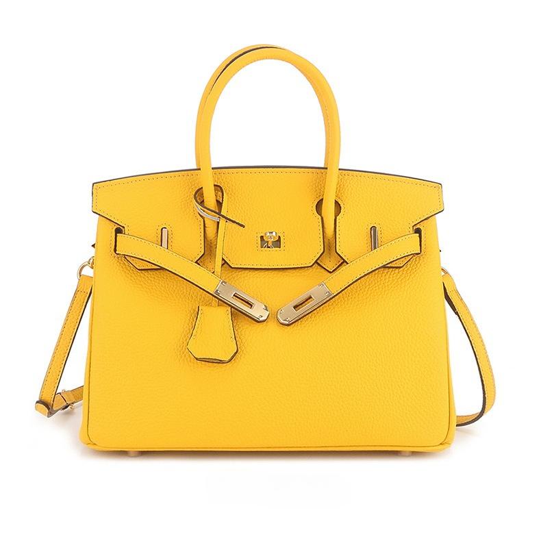 Erste Schicht togo Rindsleder große Kapazität Leder Litschi-Muster Damenmode Schloss Handtasche 25x13x19cm goldgelbe