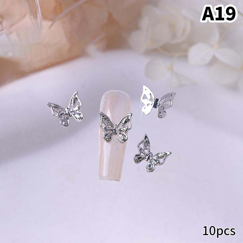 10 Teile/beutel Schmetterling Geformt Nagel Stern Blume Nagel Charme Silber Legierung Nagel Perle Schmuck Zubehör Nagel Liefert