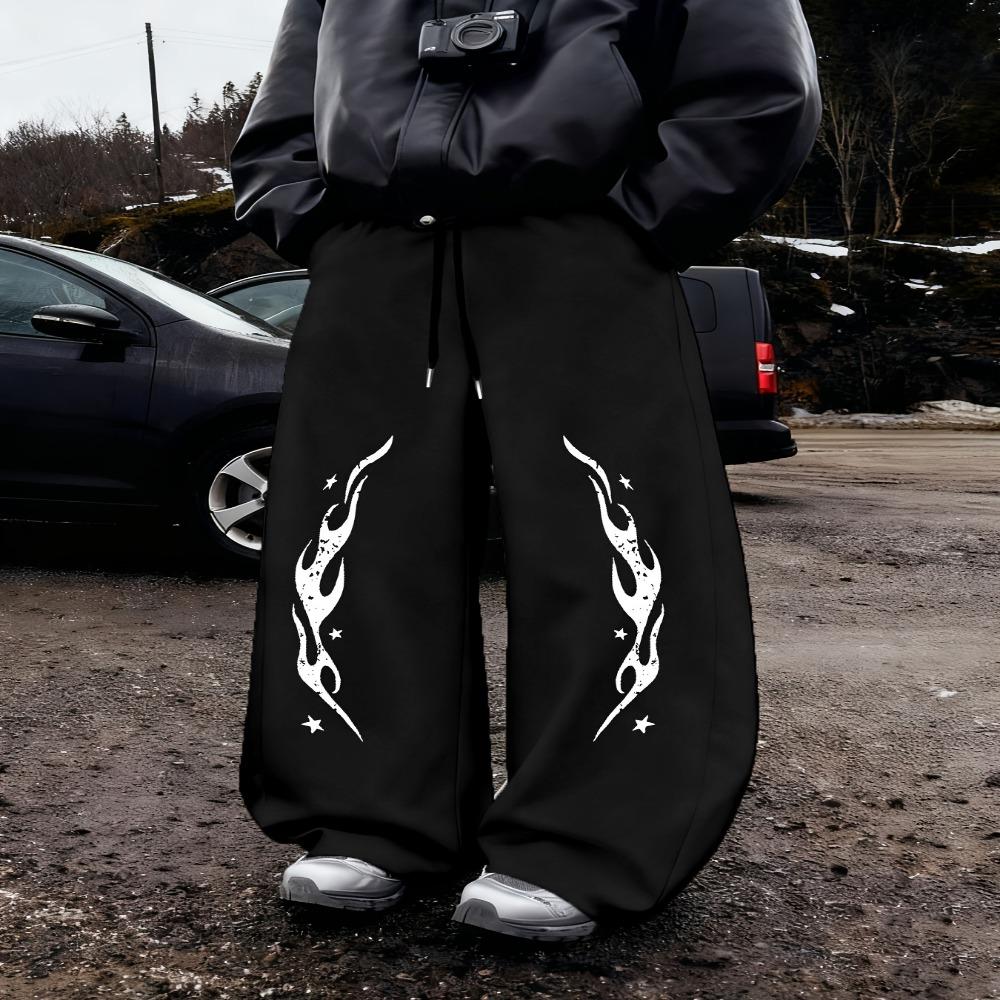 Schwarze Baggy Jogginghosen für Herren, Weites Bein Design mit weißem REVOLUTION Text Flammenstickerei, Kordelzugverschluss, Street Style S