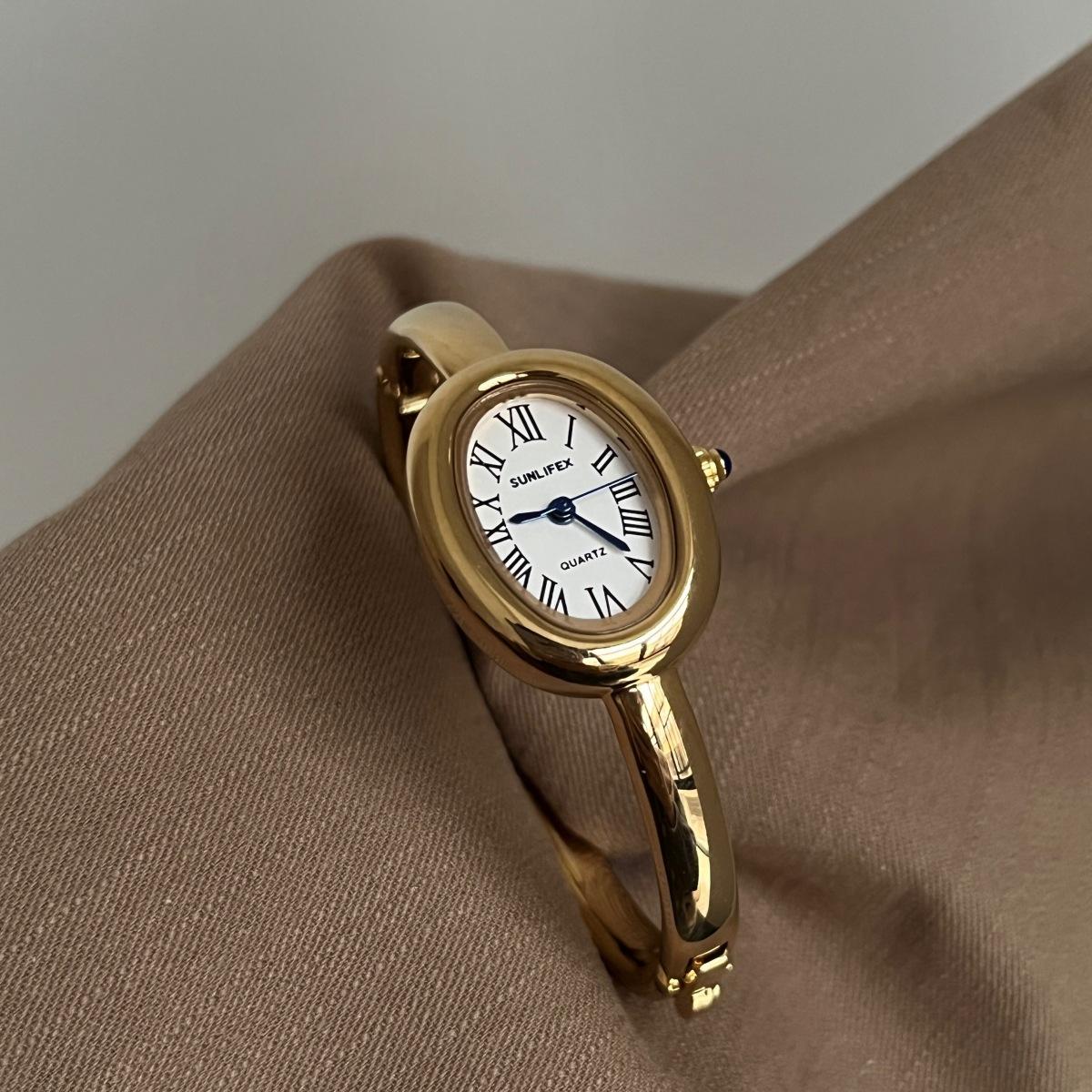 Damen Quarz Uhr Luxus Römische Ziffern Reloj Minimalistisch Schlicht Oval Uhr Damen Edelstahl Orologio Gold Gehäuse Armbanduhr