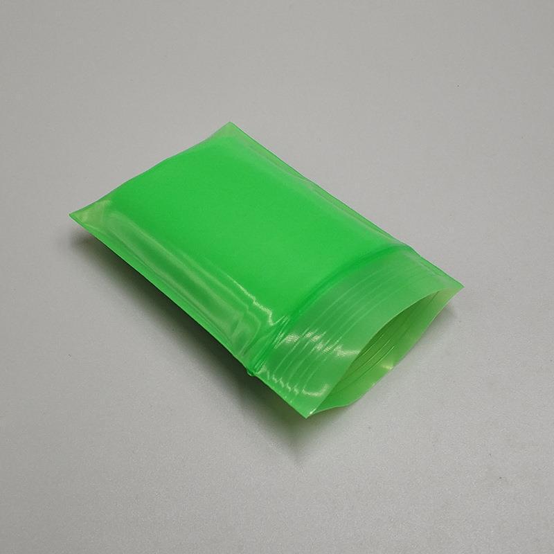 Bunte Spielzeug-Probenbeutel mit Druckverschluss und rotem Siegel, durchscheinendes Knochendesign