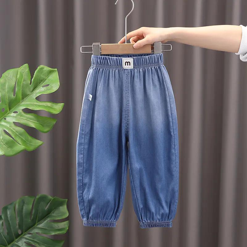 Kinderbekleidung Jungen und Mädchen Jeans Frühling und Herbst Freizeithosen Hosen Taschendruckhosen 130