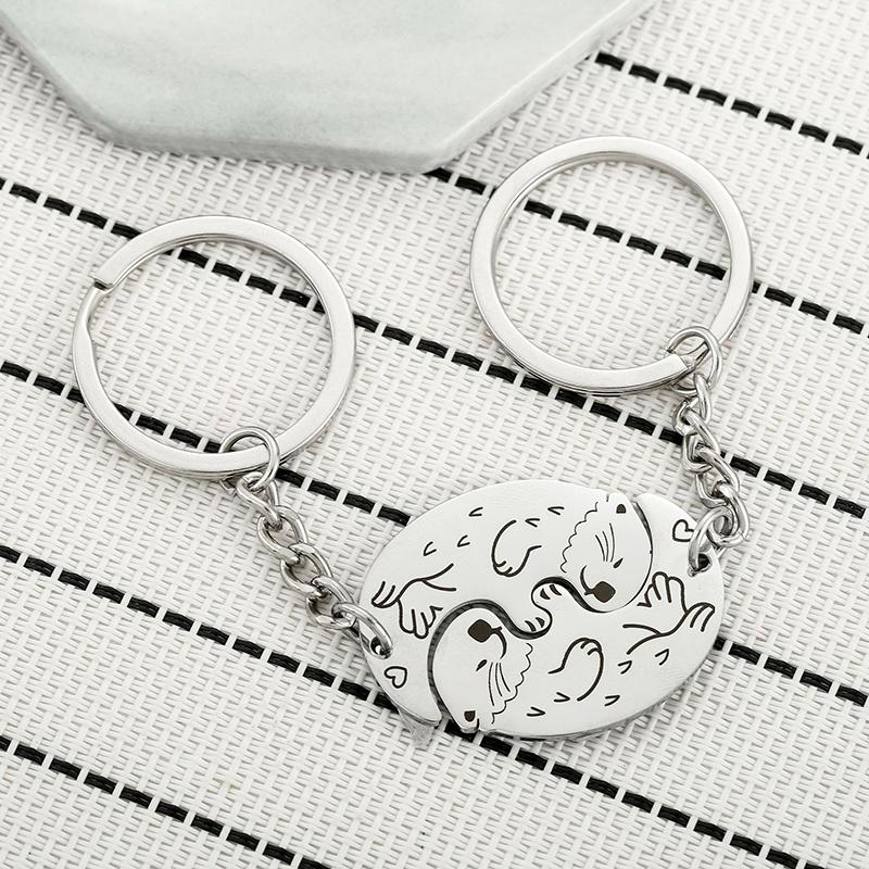Tier Schlüsselanhänger Set Auto Schlüsselanhänger Otter Schlüsselanhänger Edelstahl Taschenanhänger Geschenk für beste Freunde und Paare silber