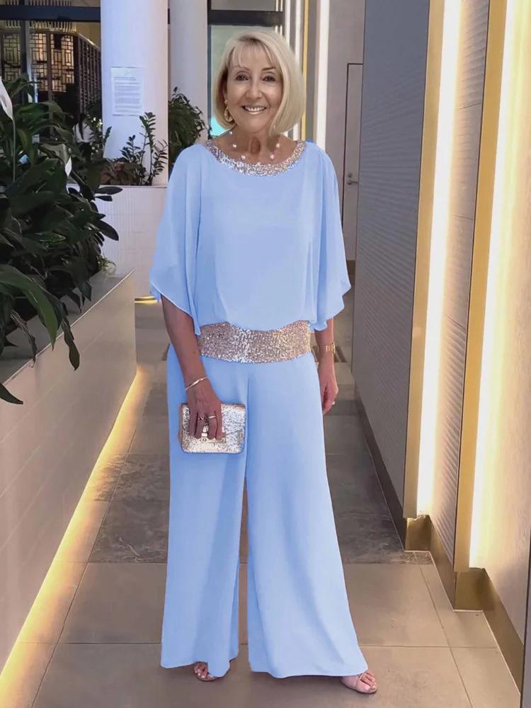 Europa und die Vereinigten Staaten Damen Anzug Rundhals Pailletten Farbe Blockieren Fledermaus Hemd Breite Bein Hosen Anzug Weibliche S himmelblaue