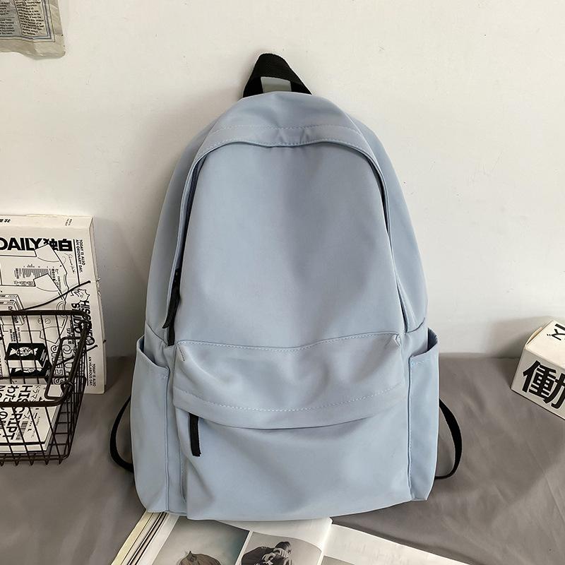 Neuer Stil Schüler-Schultaschen für Grundschulmädchen und Schüler der Unterstufe Einfache und schöne Rucksäcke