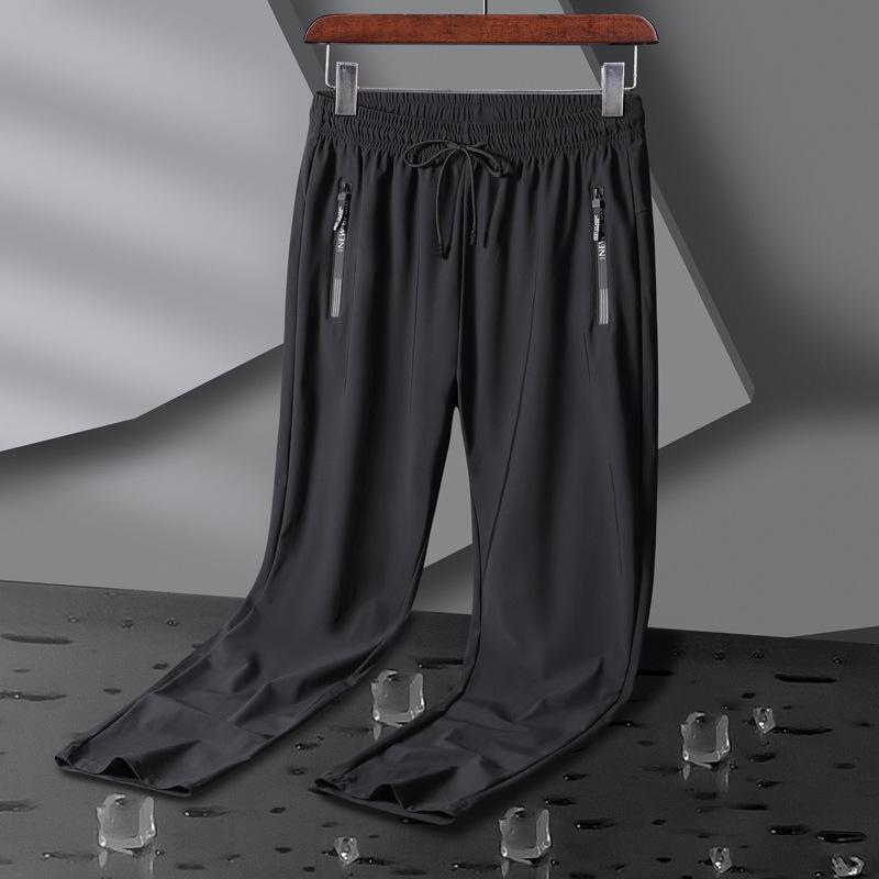 Herren-Jogginghose, feuchtigkeitsableitend, bleibt trocken und atmungsaktiv, mit Taschen und Kordelzug, Reißverschlussdetail, weich und bequem. Jogginghose für Herren XL schwarz