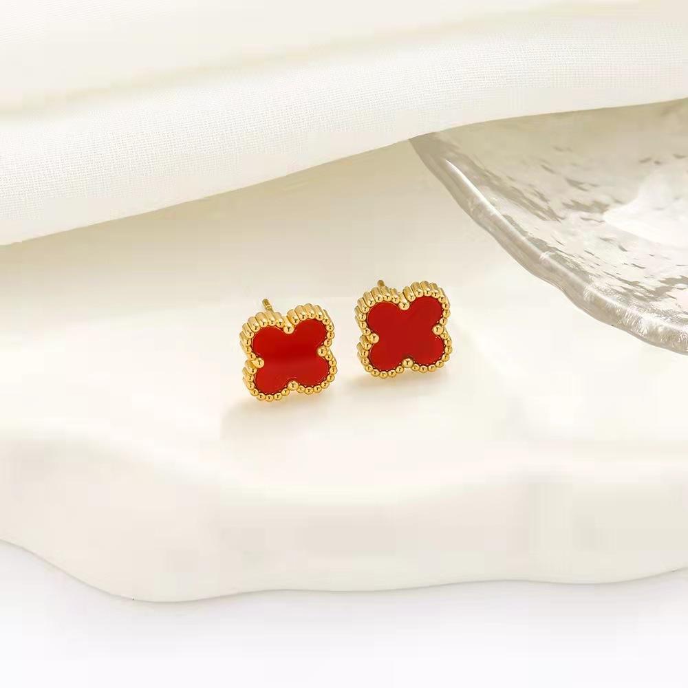 Hochwertige vierblättrige Kleeblatt-Ohrringe Leichter Luxus Mode Persönlichkeits-Ohrringe 18K Verliert keine Farbe Ohrringe 18K rot