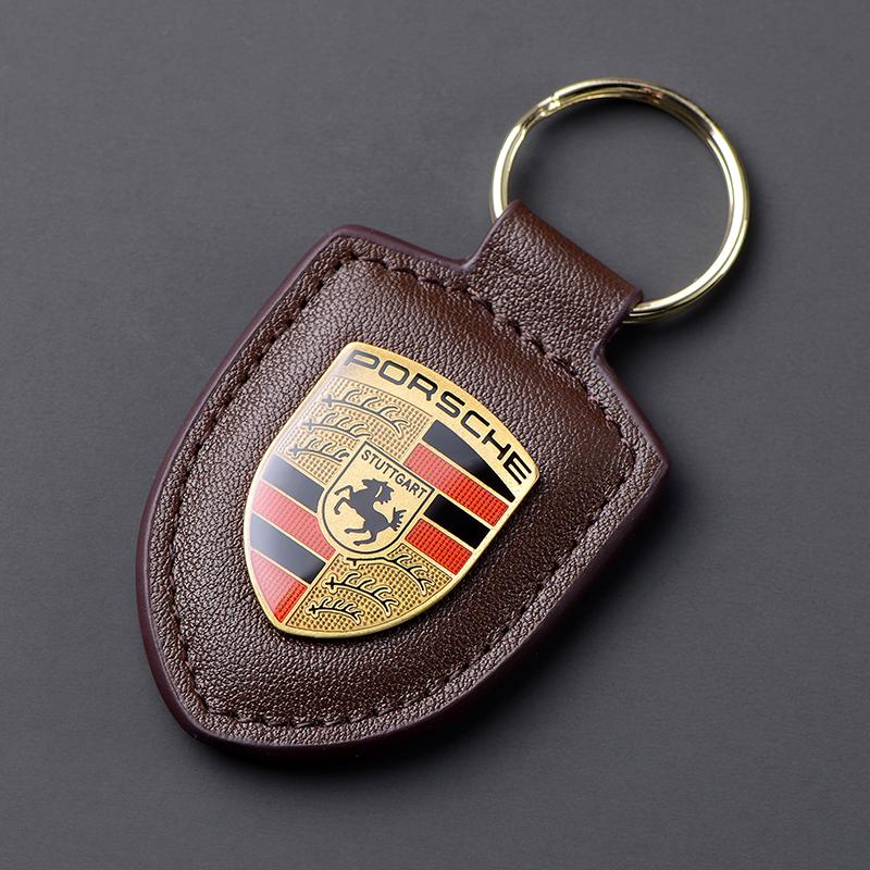 Leder Schild Emblem Auto Schlüsselanhänger Metall Luxus Schlüsselanhänger Für Porsche Cayenne Panamera Macan 911 718 Taycan Boxster Cayman 918 kaffeebraun
