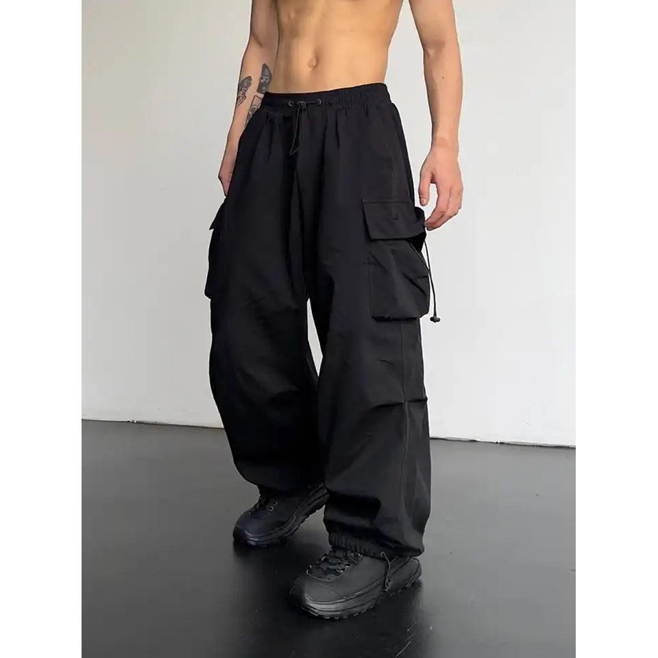 Streetwear Frühling Harem Casual Hosen Männer Elastische Taille Einfarbig Cargo Hosen Multi Tasche Lose Baggy Hosen für Frauen XXXXXL schwarz