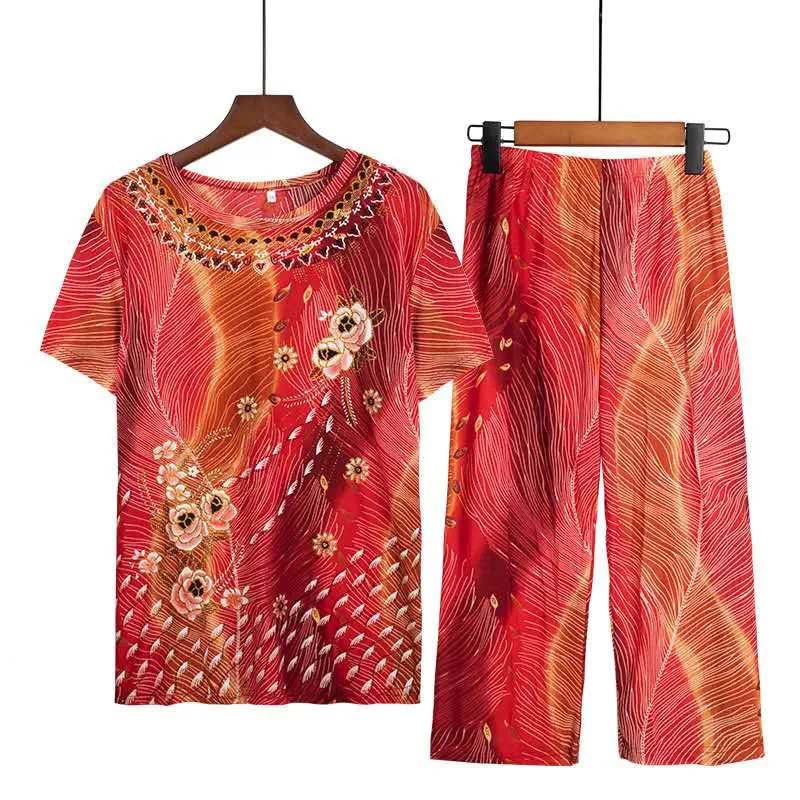 Damen-Anzug aus Eisseide, Sommer, kurzärmelig, Hose, Oberteil, zweiteiliges Set, lässig, locker, Homewear, Oberbekleidung, Anzug, Retro-Blumendruck, T-Shirt-Hose XXXL orange