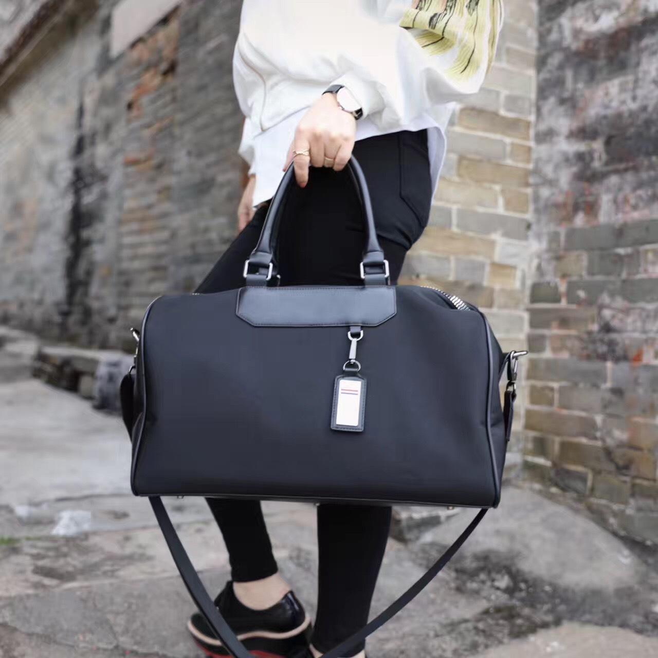 Seesack Oxford Tuch Reisetasche Reisetasche Hochwertige wasserdichte Hand Bill Schulter Umhängetasche He is a size 20. schwarz