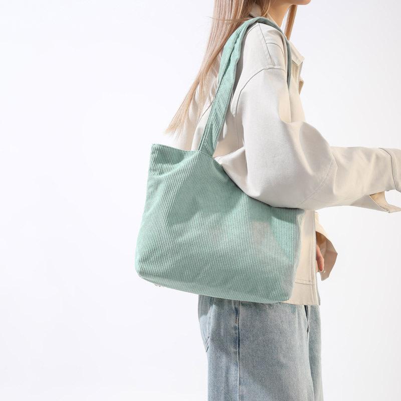 Lässige Canvas-Taschen Taschen mit großer Kapazität Damen Herbst- und Wintermode Umhängetaschen Einfache und vielseitige Klassen- und Spielzeugtaschen für Studenten white