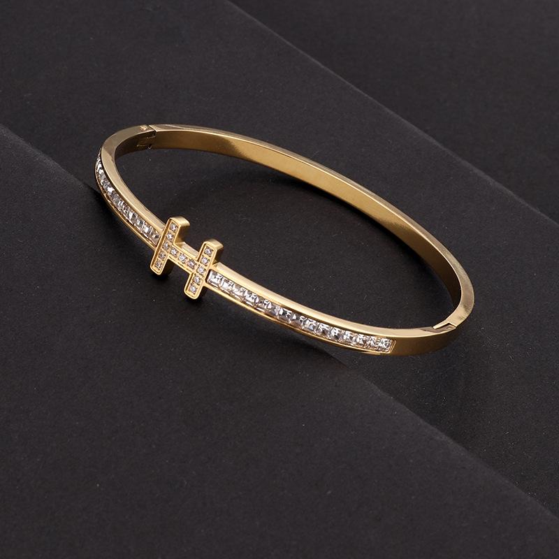 18 Karat vergoldetes Silberarmband mit Diamanten und Buchstabendesign 18K gold