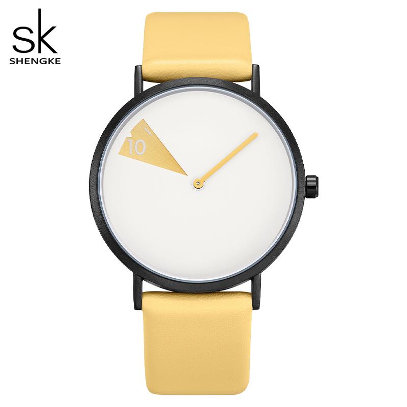 Shengke Heiße Verkäufe Kreative frauen Quarz Armbanduhren Damen Uhren Drehen Gelb Leder Band Uhr Geschenke für Freund