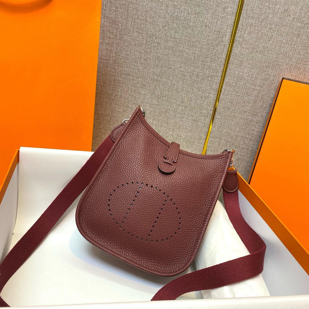 Fabrikgroßhandel erste Schicht Rindsleder Eimer Tasche Damen Tasche Litschi Muster Hohl Einzel Schulter Crossbody Tasche Hohl Design 17x6x18cm bordeaux