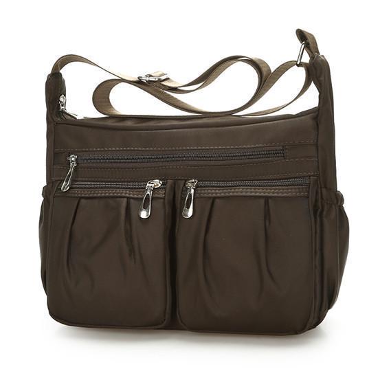 Neue Damenmode Umhängetaschen für Frauen Designer Wasserdichte Nylonhandtasche Reißverschluss Geldbörsen Messenger Umhängetasche 26*9*20cm braun