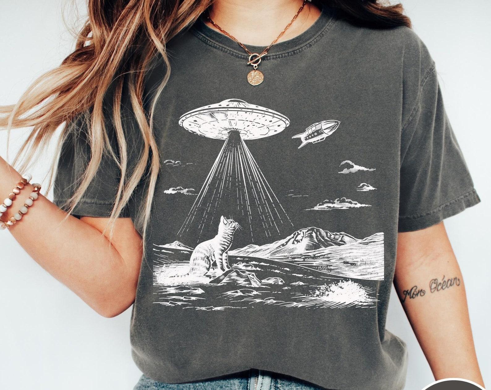 UFO Katze Komfortfarben® Shirt, Retro Vintage Western T-Shirt, Lustiges Katzen T-Shirt, Außerirdisches Oversized Grafik-T-Shirt, Trendiges Damen UFO Katzen T-Shirt M black