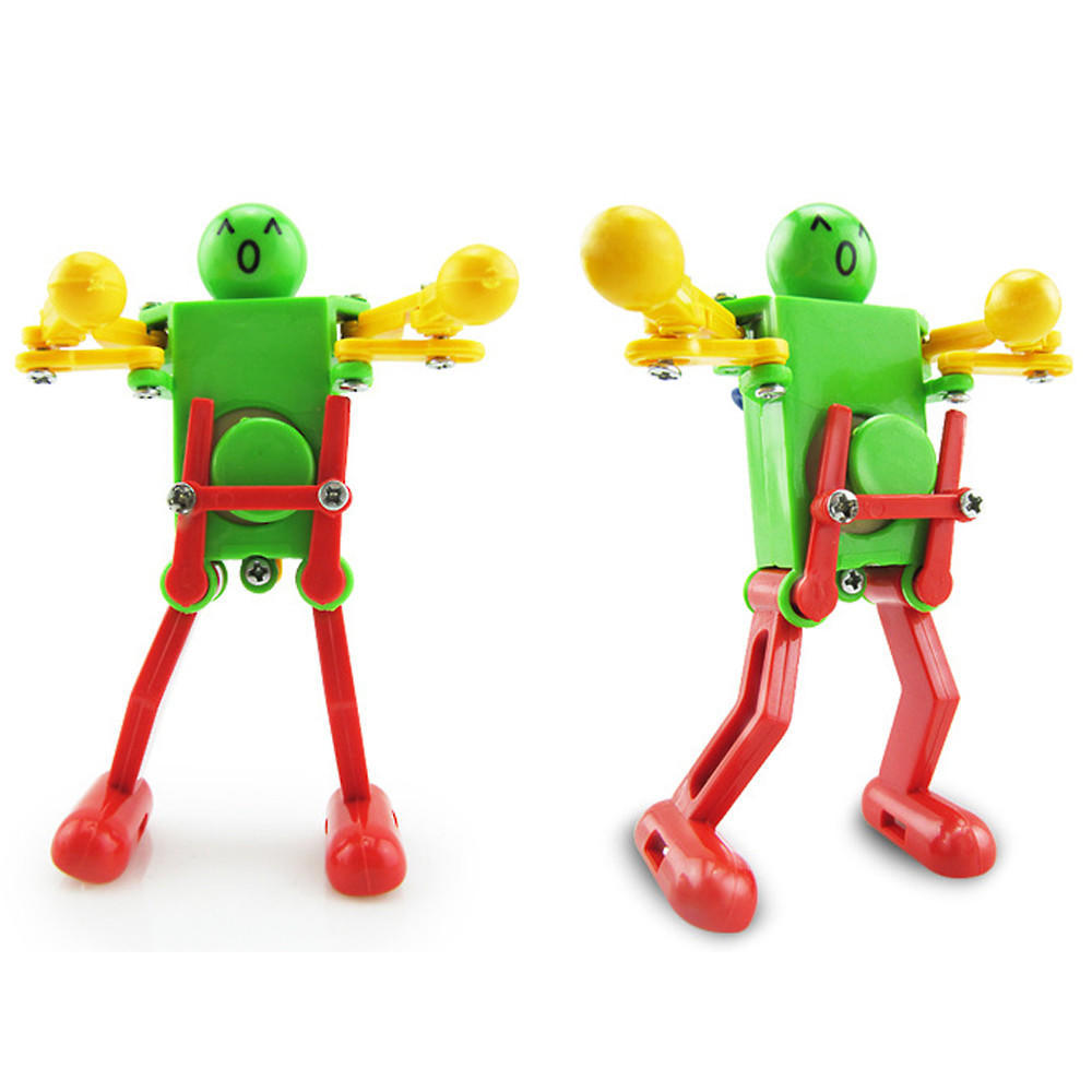 Uhrwerk Aufzieh-Tanzroboter-Spielzeug für Baby- und Kinderentwicklungsgeschenk, Puzzle-Spielzeug