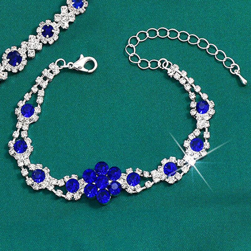 Elegantes Schmuckset mit Kristall-Edelsteinen: Halskette, Ohrringe, Armband und Ring in Tropfenform für Damen