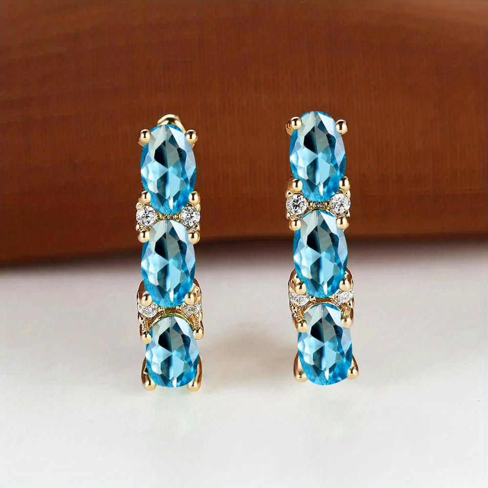 Luxus oval geschliffene grüne Stein Tropfen baumelnde Ohrringe drei Stein Clip Haken Ohrringe Frauen Gold Farbe feines Geschenk Liebe Schmuck tägliche Party Ohrringe meergrün