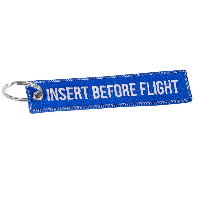 REMOVE BEFORE FLIGHT Neuheits-Schlüsselanhänger Launch-Schlüsselanhänger Bijoux-Schlüsselanhänger für Motorräder und Autos Schlüsselanhänger Neue bestickte Schlüsselanhänger Blue White