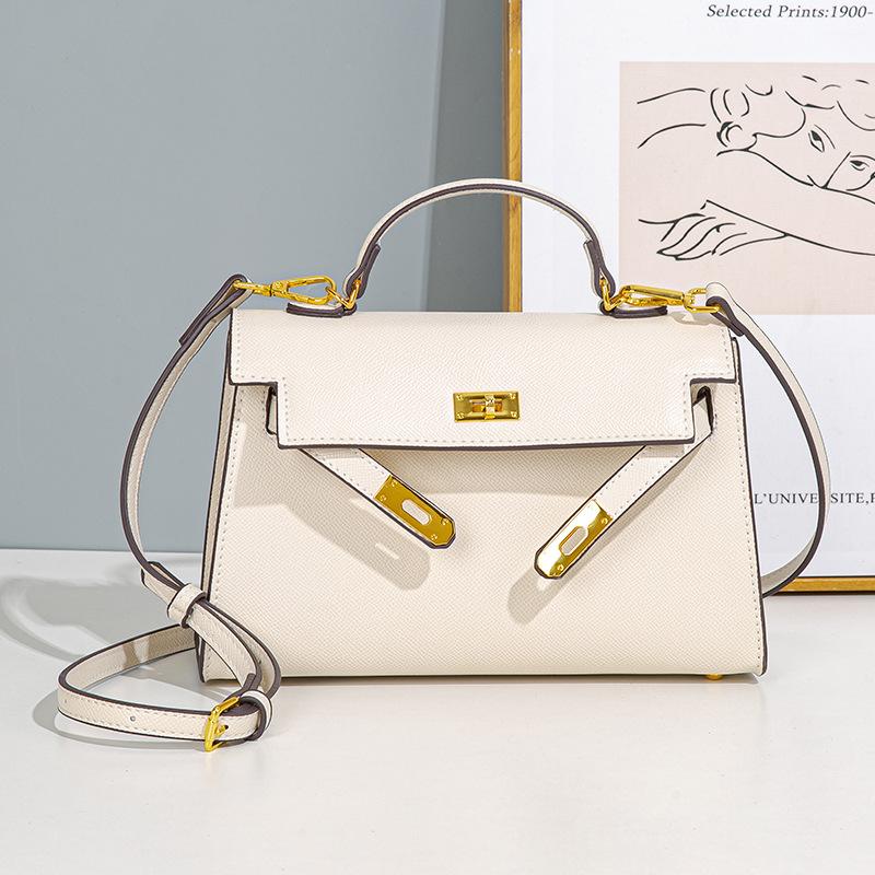 Frühling und Sommer Neue Nische Pendler Handtasche Modische und modische Handtasche für Damen Vielseitige Ein-Schulter Umhängetasche