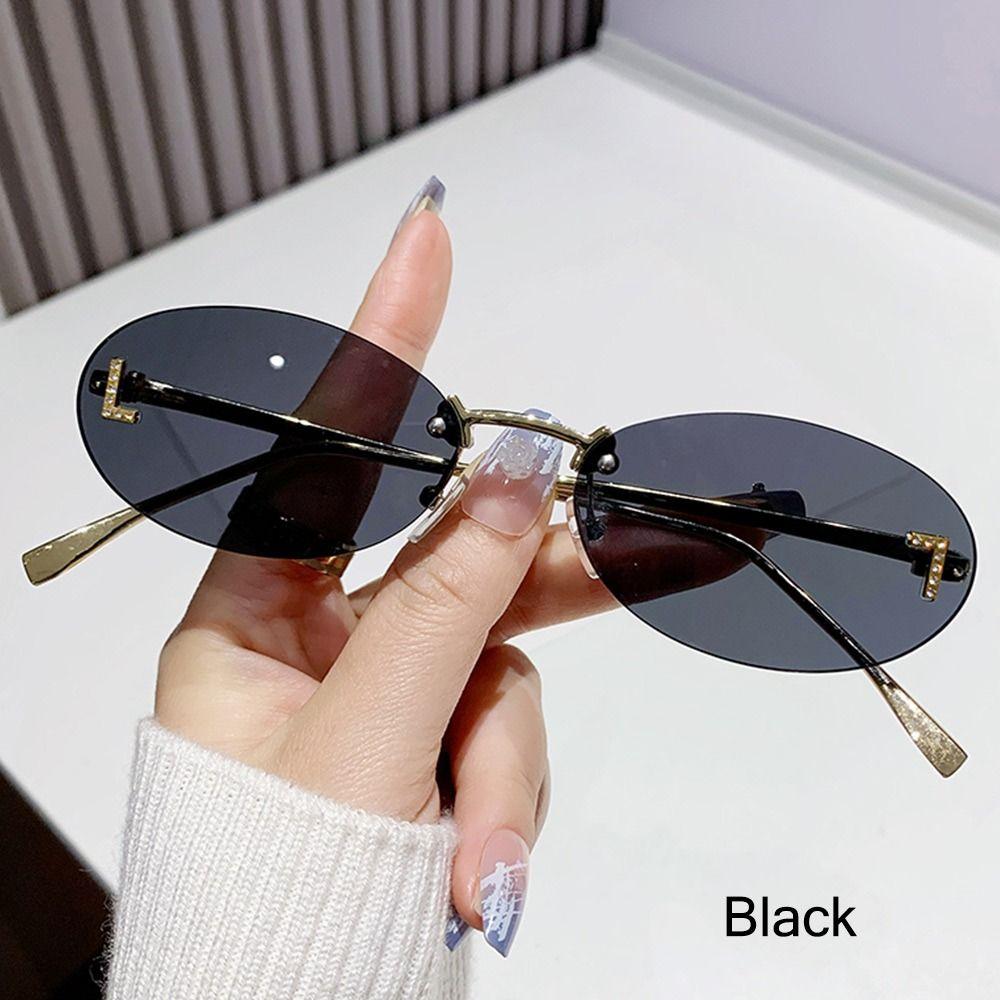 Modische ovale Sonnenbrille für Damen, Luxusqualität, Buchstabendekor, Sonnenbrille, trendige randlose Katzenaugen-Brille, UV400-Schutz, Metall Black