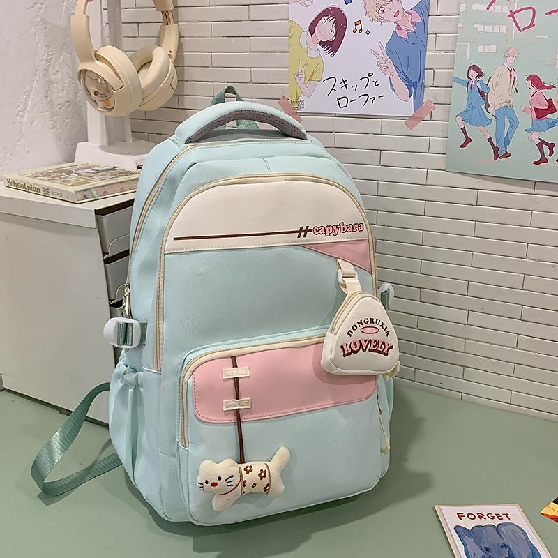 Frühling Neue Herren- und Damen-Junior High School High School Rucksack mit großem Fassungsvermögen Trend zur Reduzierung der Belastung von Studenten Rucksack Rucksack . white
