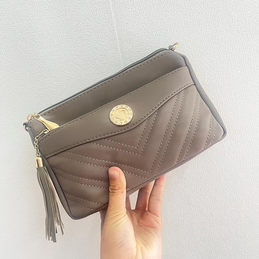 Neue Damen-Umhängetasche mit großem Fassungsvermögen, neue Sommermode, vielseitige, leichte Handytasche, Quastentasche, Damentasche