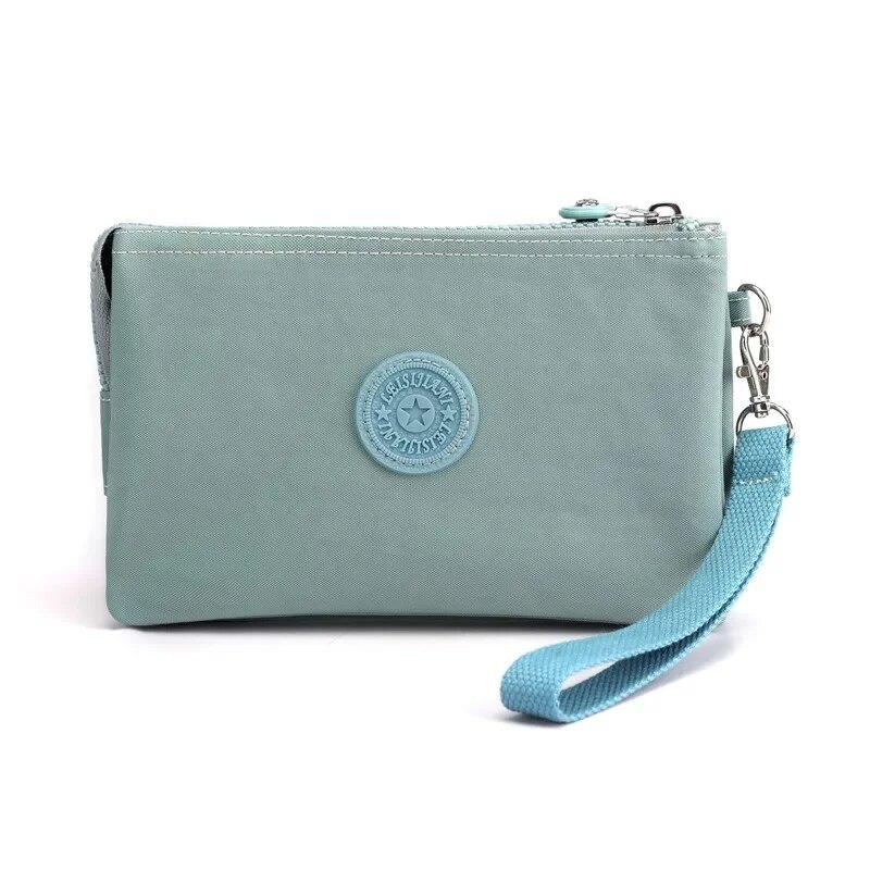 Lässige Nylon-Canvas-Münzen-Geld-Organizer-Taschen für Frauen, mehrschichtige Geldbörse, tragbare Telefon-Kulturartikel, Schlüssel-Aufbewahrung, Handtasche, Handgelenktasche see-blaue