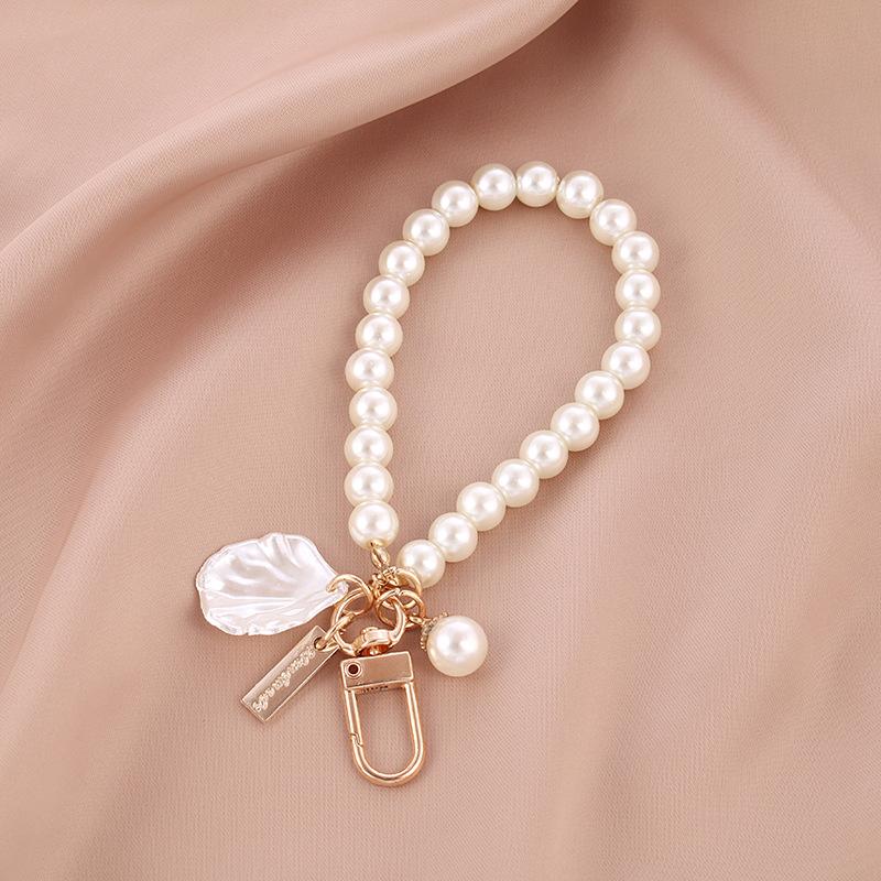 Niedlicher Perlen-Schlüsselanhänger, Luxus-Damen-Schmuck, glänzende Perlen, Muschel, Handytasche, Rucksack, Charm, Accessoire, Autoschlüssel, Schlüsselanhänger