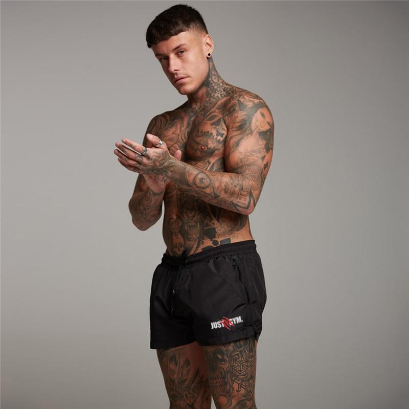 Muscleguys Sommer-Casual-Strand-Shorts für Herren, tägliche schmale Herren-Shorts, Schweiß-Lauf-Fitness-Shorts, modischer Druck, Fitnessstudio, Bodybuilding, kurze Hosen XL schwarz
