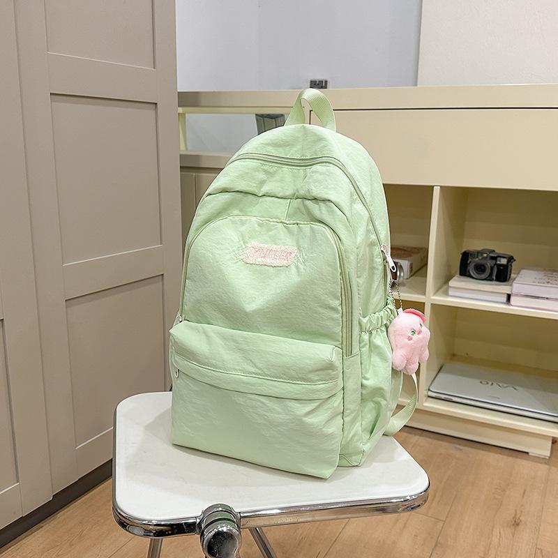 Neue Schultasche für College-Studenten Rucksack Junior High School Japanisch Schlicht Klein Frisch Campus-Rucksack Großes Fassungsvermögen Lässiger Rucksack
