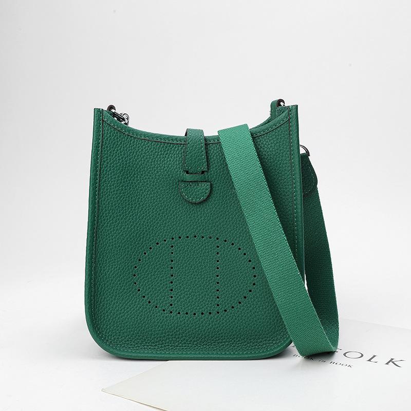 Fabrikgroßhandel erste Schicht Rindsleder Eimer Tasche Damen Tasche Litschi Muster Hohl Einzel Schulter Crossbody Tasche Hohl Design 22x9x23cm dschungel grün
