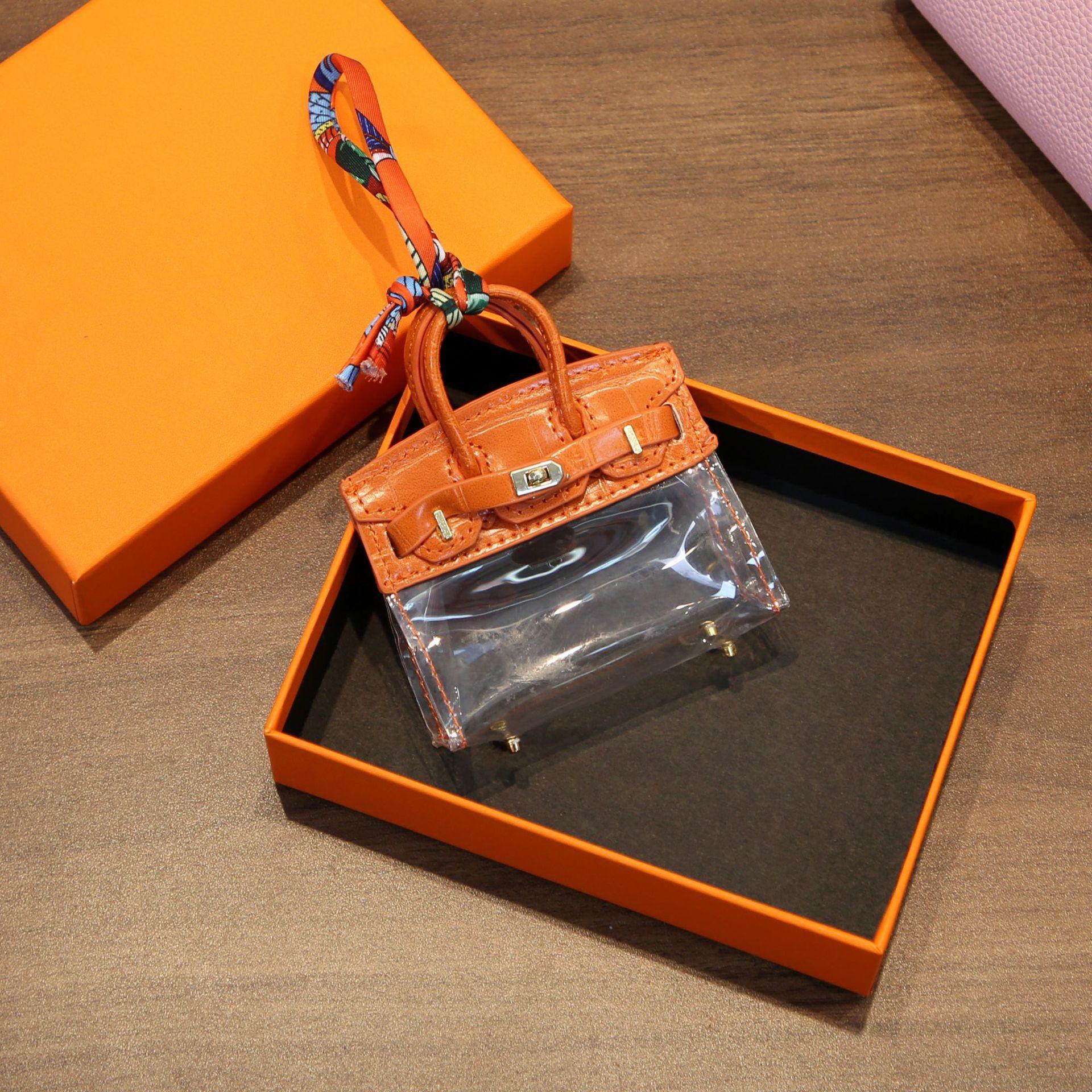Internet Celebrity Keybag Transparent Platin Tasche Mini Anhänger Kopfhörer Lippenstift Autoschlüssel Zero Wallet Autozubehör für Frauen 8.5x3x10cm orange