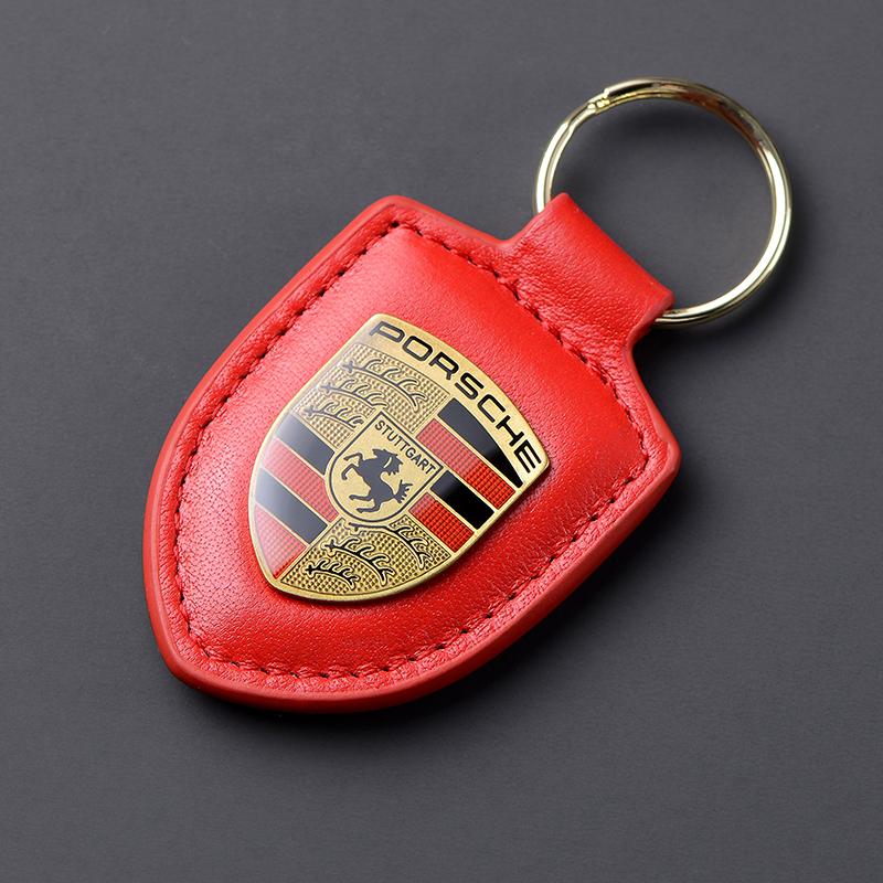 Leder Schild Emblem Auto Schlüsselanhänger Metall Luxus Schlüsselanhänger Für Porsche Cayenne Panamera Macan 911 718 Taycan Boxster Cayman 918 rot