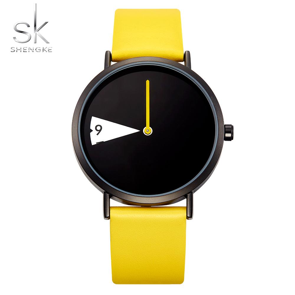 Shengke Heiße Verkäufe Kreative frauen Quarz Armbanduhren Damen Uhren Drehen Gelb Leder Band Uhr Geschenke für Freund gelb
