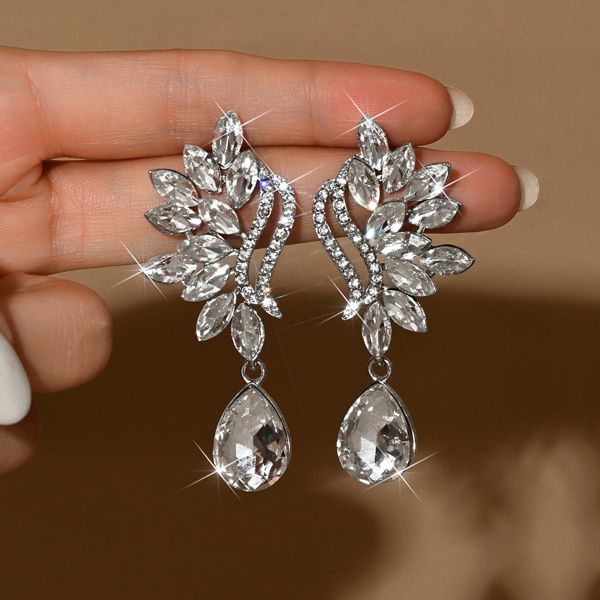 Kreative Ohrringe, Mode Temperament, Diamantbesetzte High-End Leichte Luxus-Ohrringe, Damen Persönlichkeit Super Flash Bankett-Ohrringe