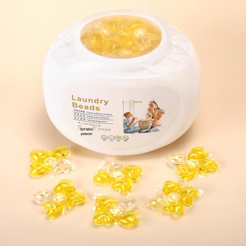 Fünf-in-Eins Waschmittel-Pods: Lang anhaltender Duft, Fleckenentfernung, Weichspülen und konzentrierte Waschmittelperlen.