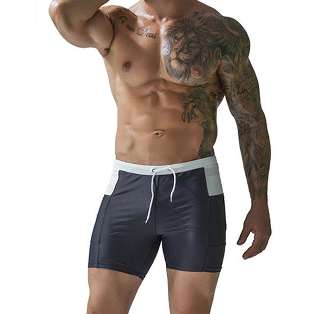 Herren wasserdichter, schnell trocknender Shorts-Badeanzug mit Taschen, Surfhose, Badeanzug, Strand, Pool XL dunkelgraue
