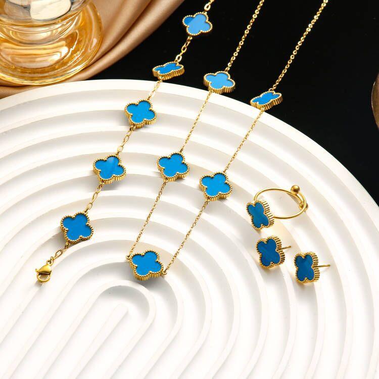 4-teiliges doppelseitiges Kleeblatt-Halskettenset aus Titanstahl für Damen, lichtechtes Charm-Set aus Titanstahl für Halskette, Armband, Ohrringe und Ring 4PCS blau