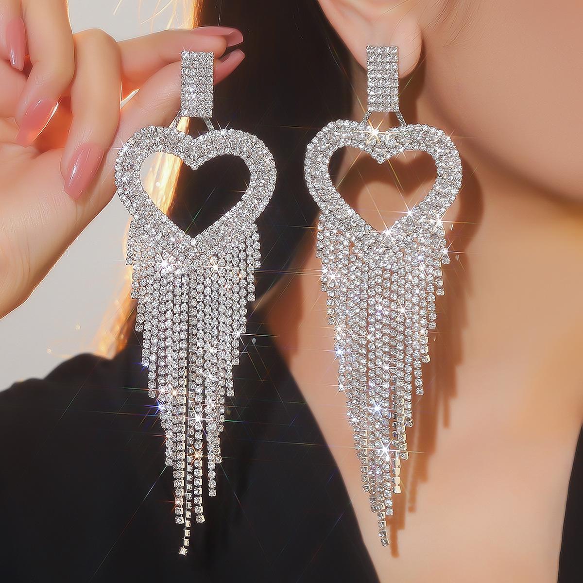 Hochwertige schwere Modelle Luxus lange Quaste Liebe Ohrringe Mode Temperament glänzende Strass Ohrringe Performance Ohrringe Damen Ohrringe 1 Paar brown