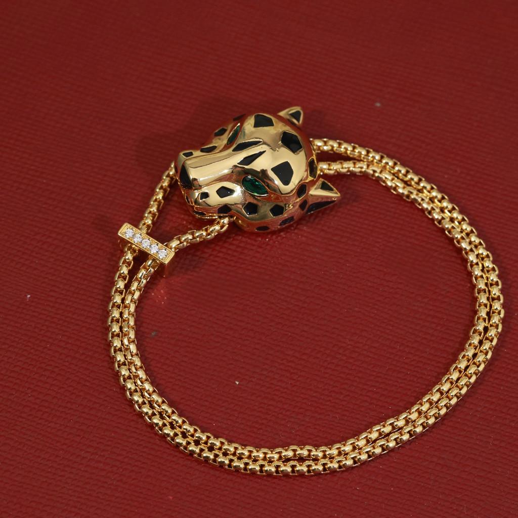 Leopardenarmband mit Sub-Gold-Material galvanisiert mit 18 Karat Gold und gepaart mit Smaragd-Leopardenaugen-Schmuck