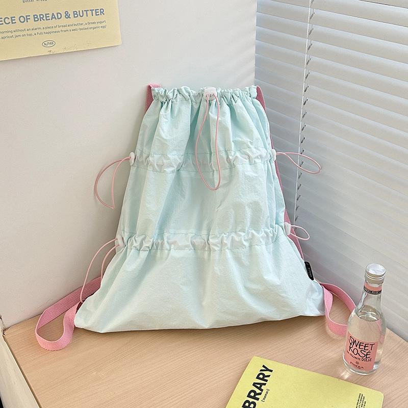 Neuer weißer Rucksack mit Kordelzug für Damen Koreanischer Lässiger Stil Rucksack Leichter Nylon Reise Rucksack Factory straight hair