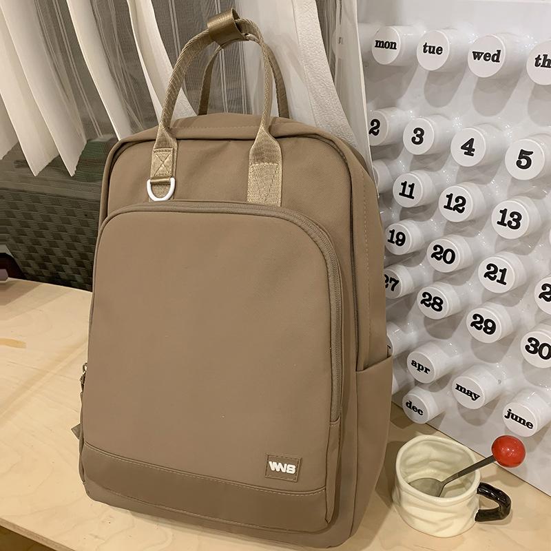 Handliche Schultaschen für Grundschüler Mädchen der ersten Klasse Mittelschüler Neue Rucksäcke in Unifarben