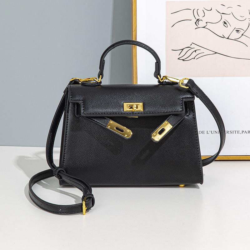 Frühling und Sommer Neue Nische Pendler Handtasche Modische und modische Handtasche für Damen Vielseitige Ein-Schulter Umhängetasche