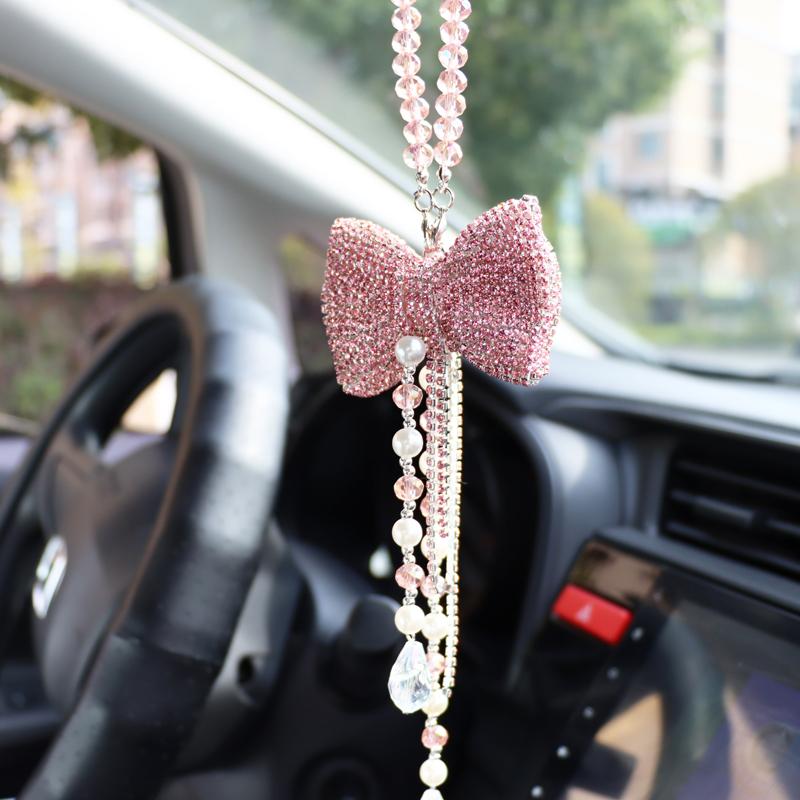 Kreativer Diamant-Bowknot-Autoanhänger, süßer Kristallquasten-Kettenrückspiegel-Verzierung, Perle, Strass, Autozubehör für Damen rosa