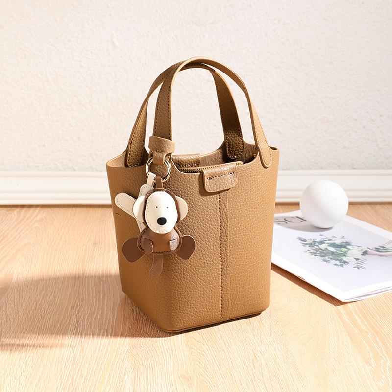 Echtleder Damenhandtaschen Leichter Luxus Nischen Eimerhandtaschen Neue vielseitige Handtaschen Damen High-End Schultertaschen beige