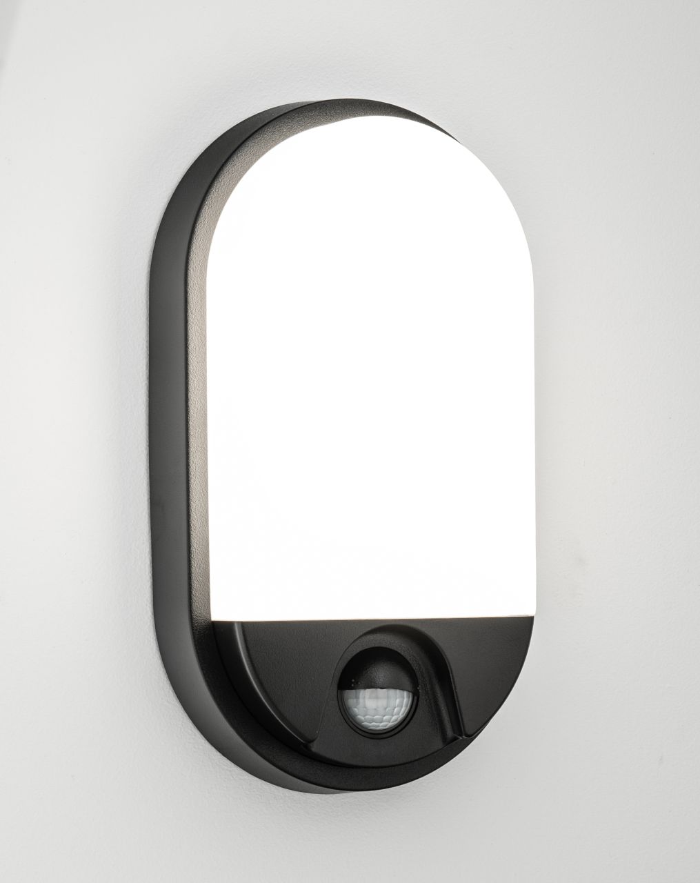 Wand- Deckenleuchte mit Bewegungsmelder 15Watt schwarz oval