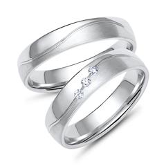 Trauringe aus Weißgold oder Platin mit 3 Diamanten